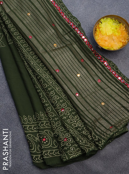 Semi georgette saree sap green with allover bandhani prints and mirror work printed border