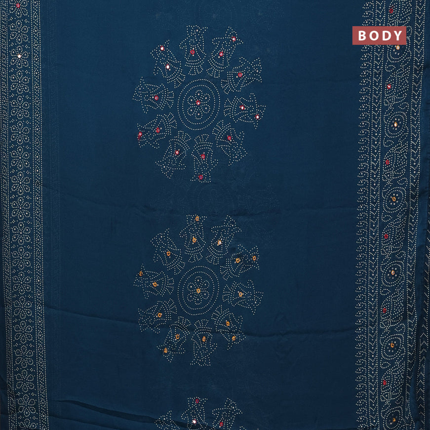 Semi georgette saree peacock blue with allover bandhani prints and mirror work printed border