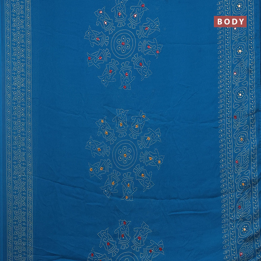 Semi georgette saree cs blue with allover bandhani prints and mirror work printed border