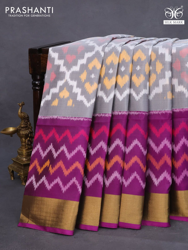 Ikat soft silk saree off white grey and purple with allover ikat weaves and long ikat woven zari border