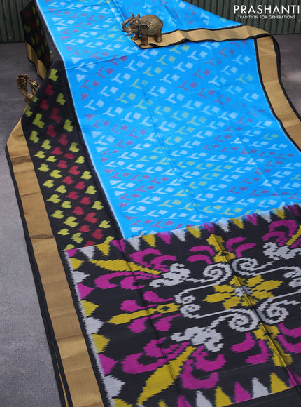 Ikat soft silk saree blue and black with allover ikat butta weaves and long ikat woven zari border