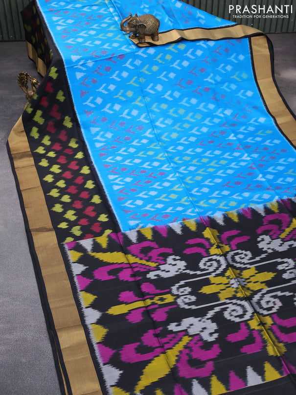 Ikat soft silk saree blue and black with allover ikat butta weaves and long ikat woven zari border