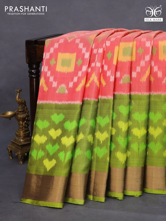 Ikat soft silk saree peach pink and light green with allover ikat weaves and long ikat woven zari border