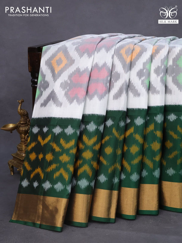 Ikat soft silk saree off white grey and dark green with allover ikat weaves and long ikat woven zari border