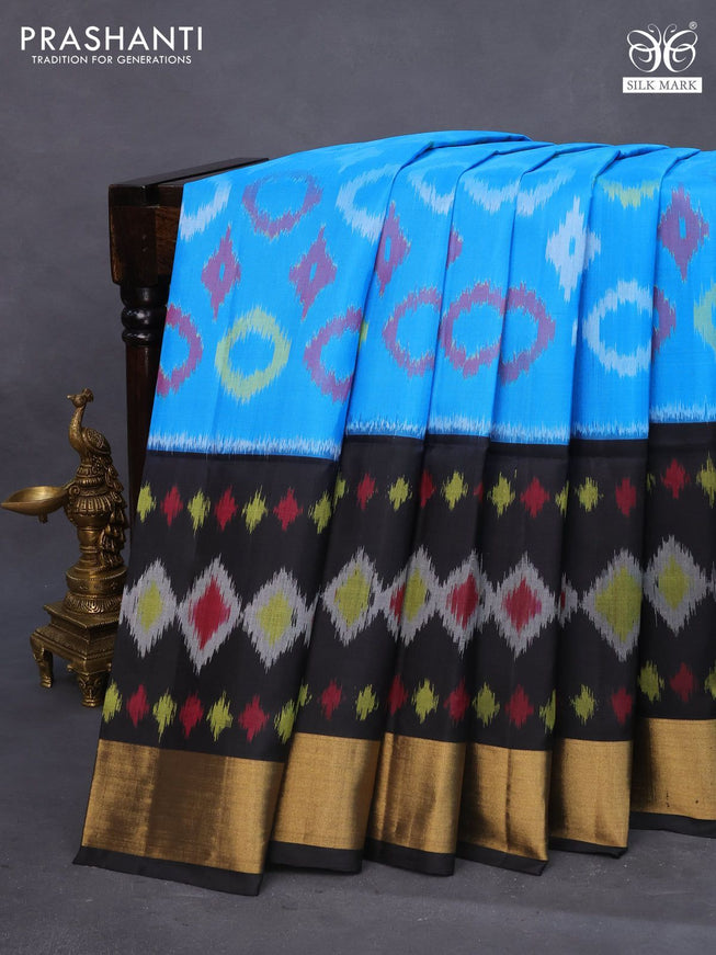 Ikat soft silk saree cs blue and black with allover ikat weaves and zari woven border