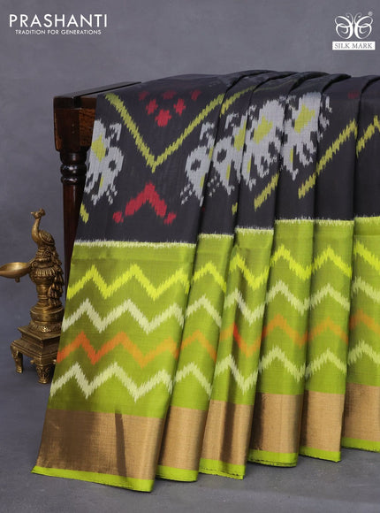 Ikat soft silk saree black and lime green with allover ikat weaves and zari woven border