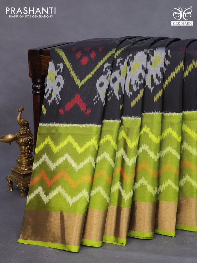 Ikat soft silk saree black and lime green with allover ikat weaves and zari woven border