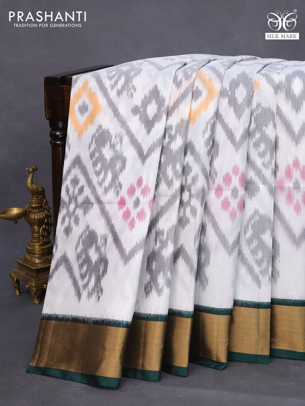 Ikat soft silk saree off white and green with allover ikat weaves and zari woven border