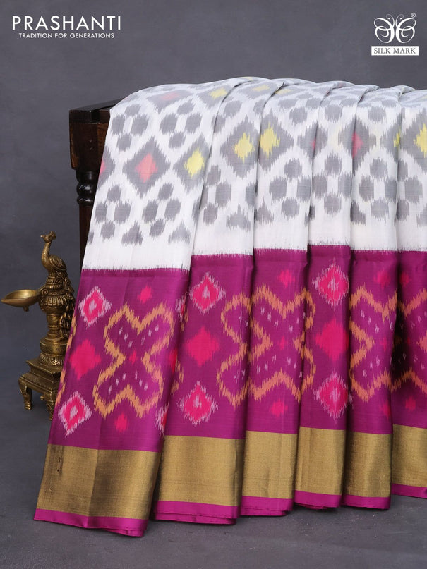 Ikat soft silk saree off white and purple with allover ikat weaves and zari woven border