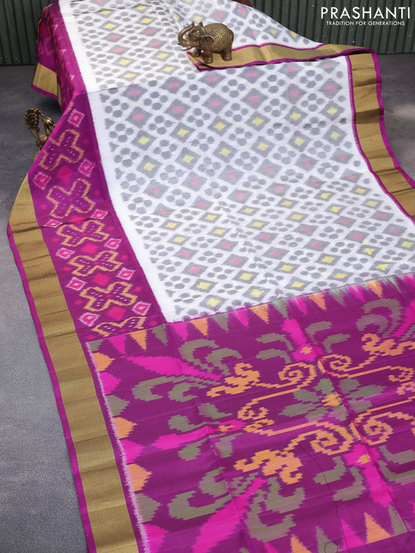 Ikat soft silk saree off white and purple with allover ikat weaves and zari woven border