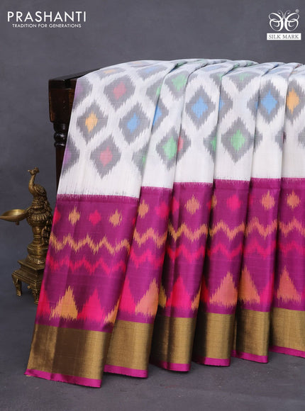 Ikat soft silk saree off white and purple with allover ikat weaves and zari woven border