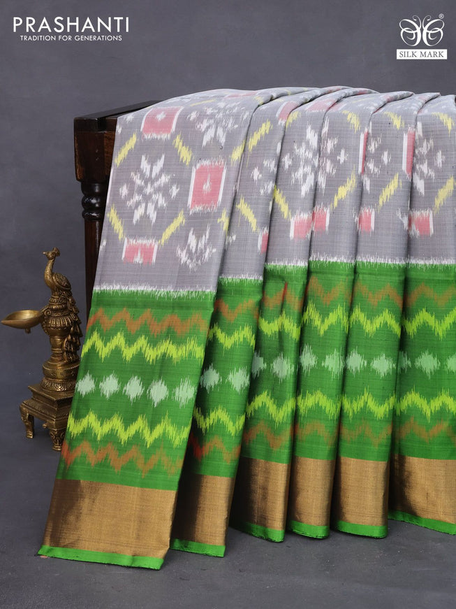 Ikat soft silk saree grey and green with allover ikat weaves and zari woven border