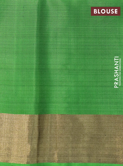 Ikat soft silk saree grey and green with allover ikat weaves and zari woven border