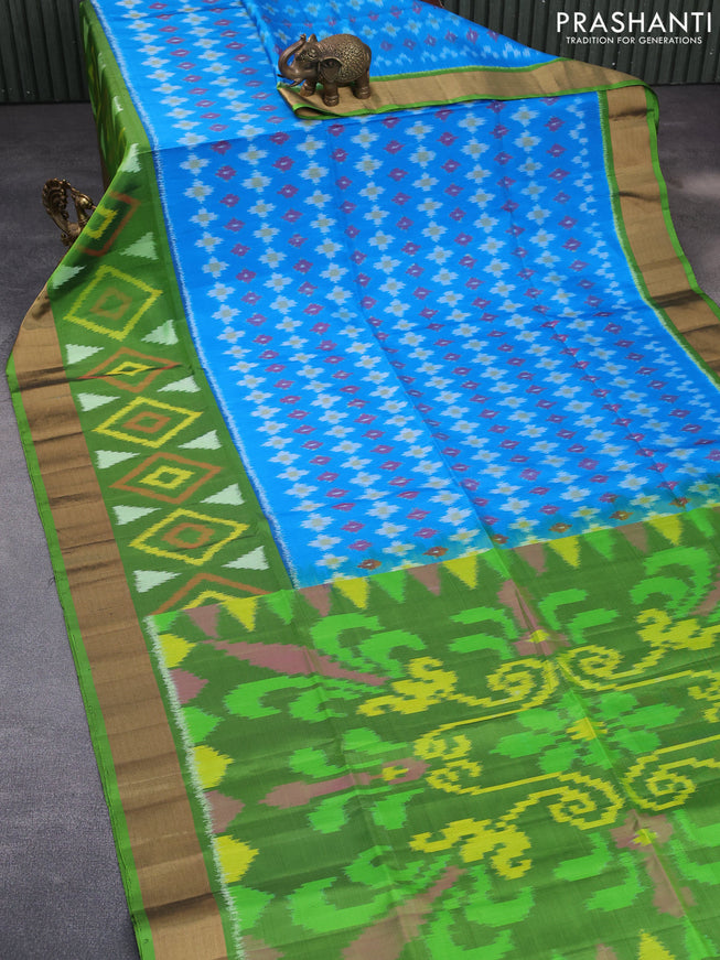 Ikat soft silk saree cs blue and green with allover ikat weaves and zari woven border