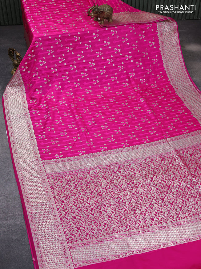 Mushru silk saree magenta pink with allover self emboss & zari weaves and rich zari woven border