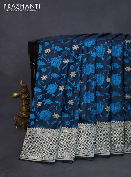 Mushru silk saree black and blue with allover self emboss & zari weaves and rich zari woven border