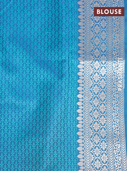 Mushru silk saree dual shade of bluish teal green with allover self emboss and rich zari woven border