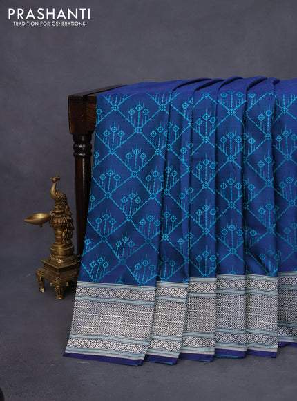 Mushru silk saree dual shade of blue and teal green with allover self emboss and rich zari woven border