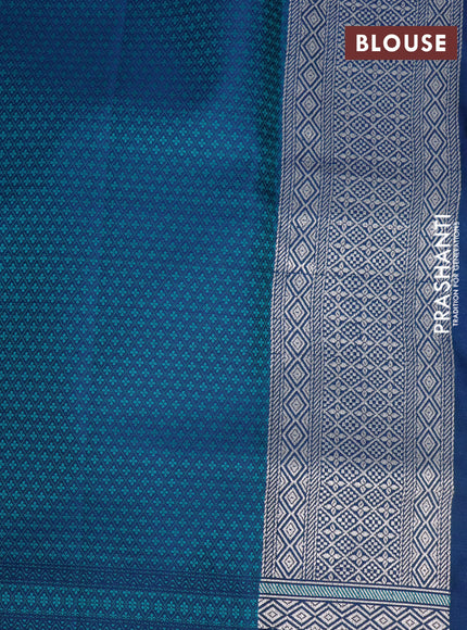 Mushru silk saree dual shade of blue and teal green with allover self emboss and rich zari woven border