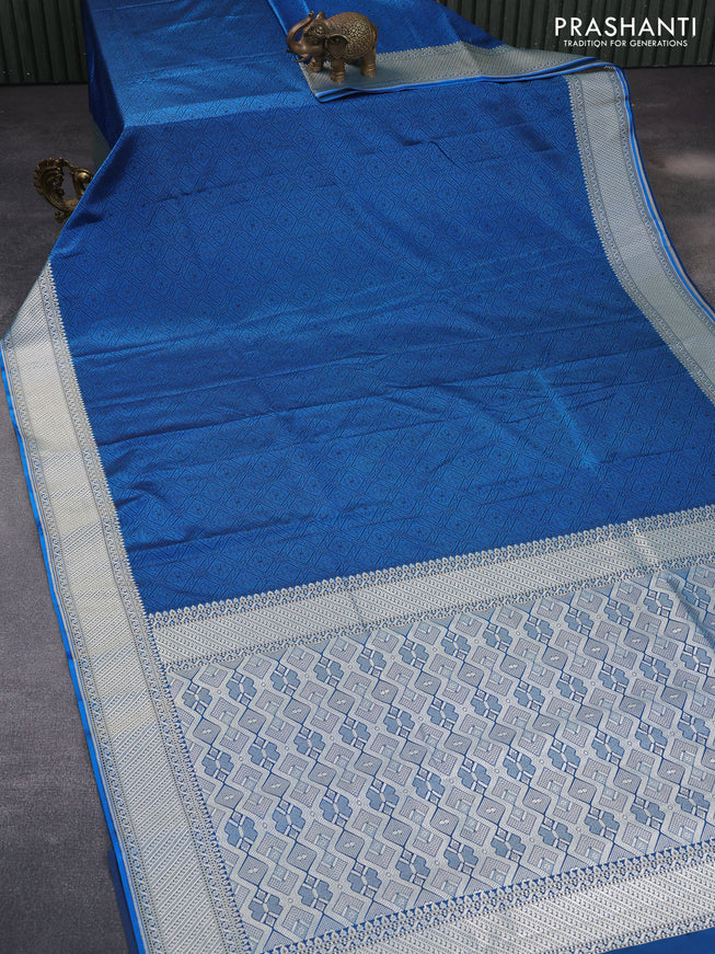 Mushru silk saree cs blue with allover self emboss and rich zari woven border