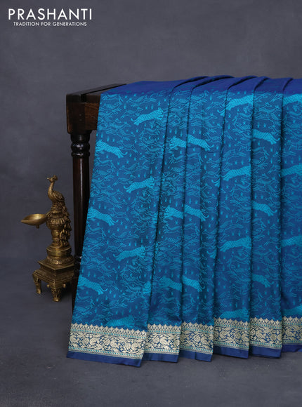 Mushru silk saree dual shade of bluish teal green with allover self emboss and rich zari woven border