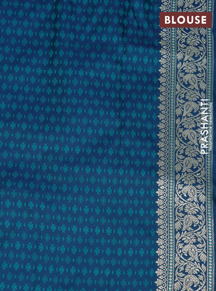 Mushru silk saree dual shade of bluish teal green with allover self emboss and rich zari woven border