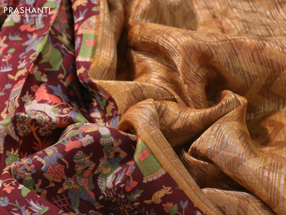 Semi mysore silk saree maroon and mustard yellow with allover kalamkari prints and zari woven butta border