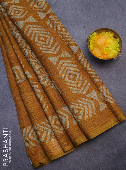 Jute cotton saree mustard yellow with batik butta prints and printed border