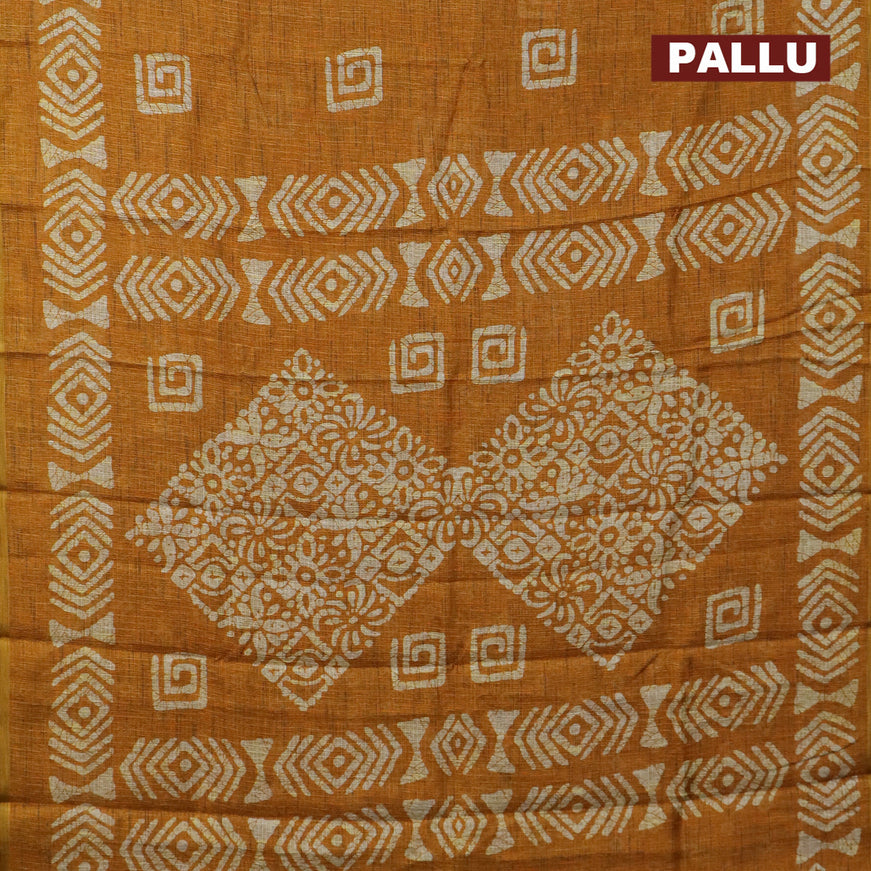 Jute cotton saree mustard yellow with batik butta prints and printed border