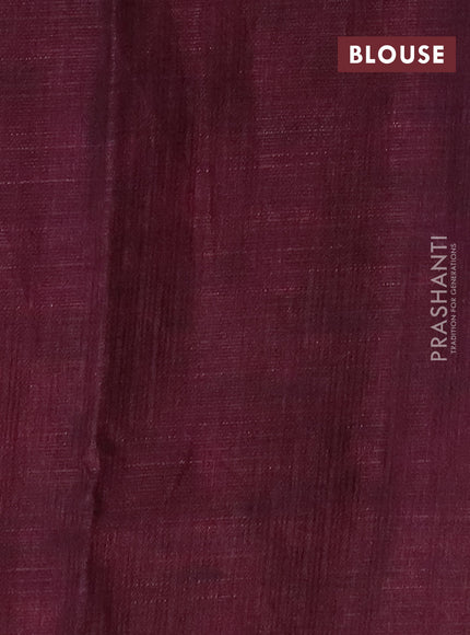 Jute cotton saree wine shade with allover leaf prints and simple border