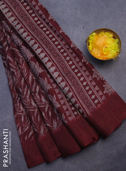 Jute cotton saree deep maroon with allover leaf prints and simple border