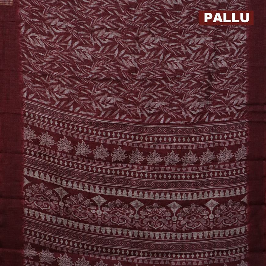 Jute cotton saree deep maroon with allover leaf prints and simple border