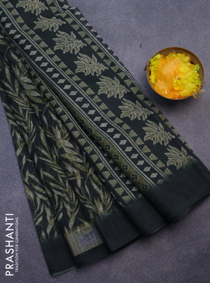 Jute cotton saree bottle green with allover leaf prints and simple border