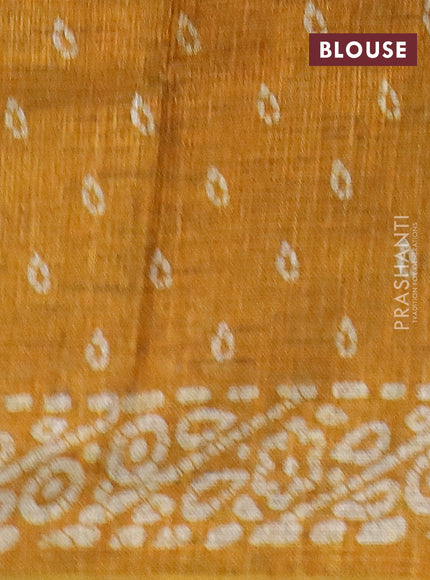 Jute cotton saree mustard yellow with batik butta prints and printed border