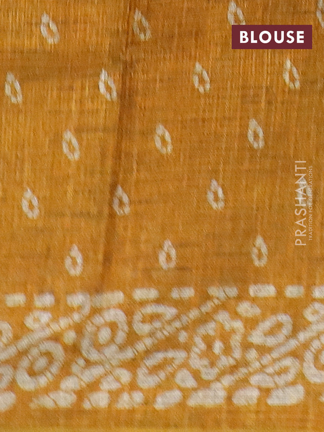 Jute cotton saree mustard yellow with batik butta prints and printed border