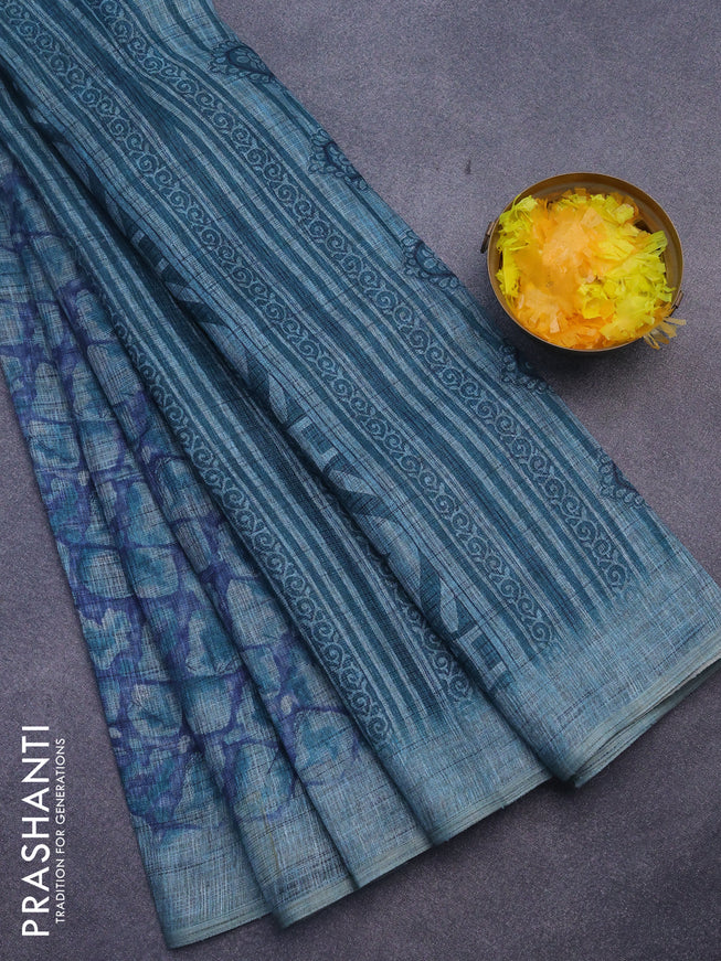 Jute cotton saree blue and teal blue with allover floral prints and simple border