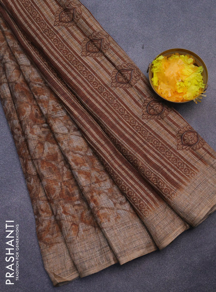 Jute cotton saree brown shade with allover floral prints and simple border