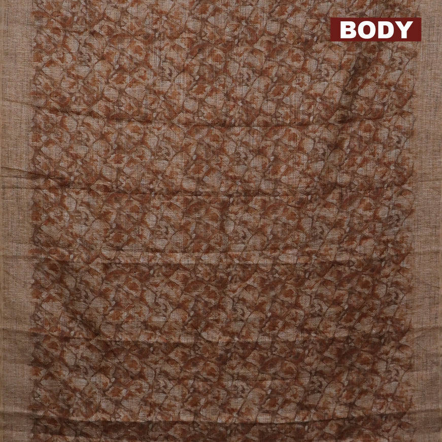 Jute cotton saree brown shade with allover floral prints and simple border