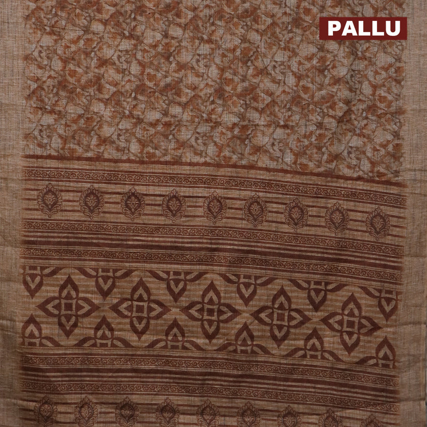 Jute cotton saree brown shade with allover floral prints and simple border