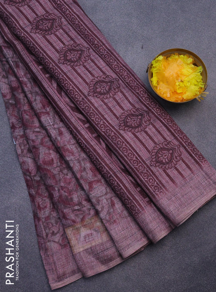 Jute cotton saree mild purple shade with allover floral prints and simple border