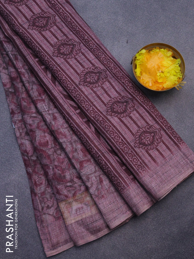 Jute cotton saree mild purple shade with allover floral prints and simple border