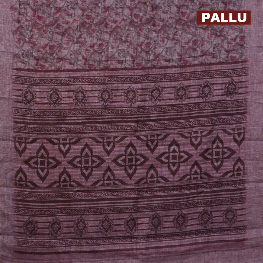 Jute cotton saree mild purple shade with allover floral prints and simple border