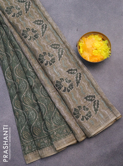 Jute cotton saree sap green with allover prints and printed border