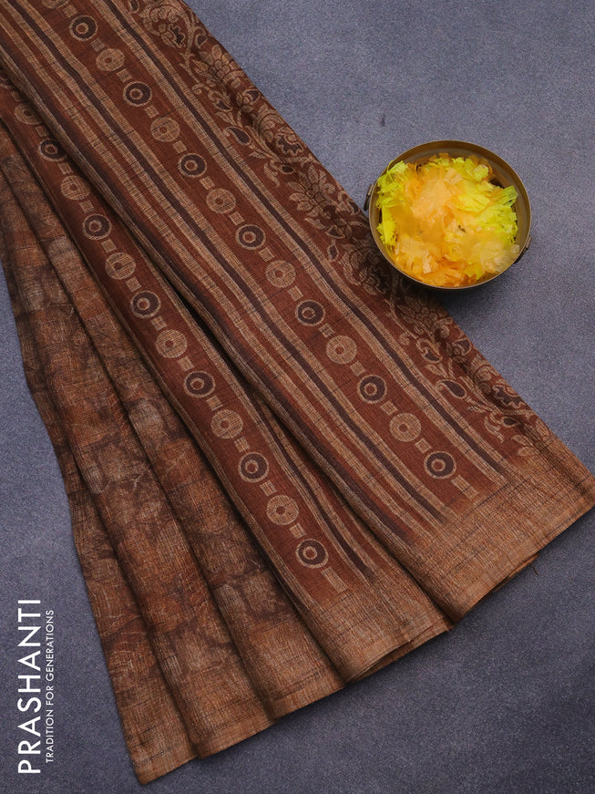 Jute cotton saree brown and rust shade with allover leaf prints and simple border