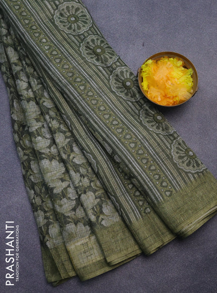 Jute cotton saree sap green with allover floral prints and simple border