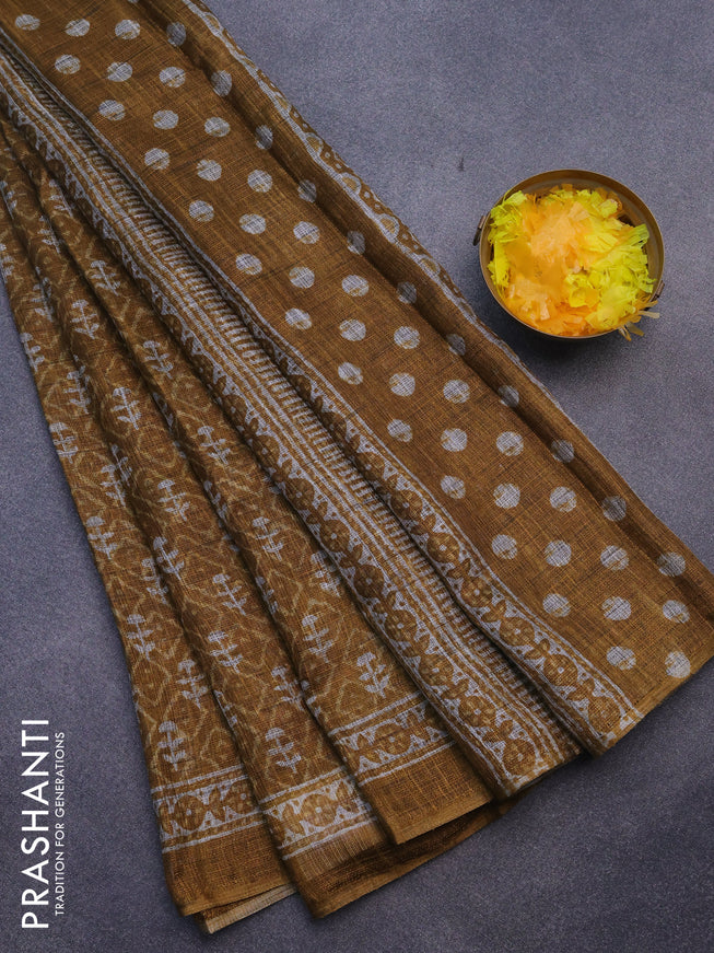 Jute cotton saree dark mustard with allover ikat prints and printed border