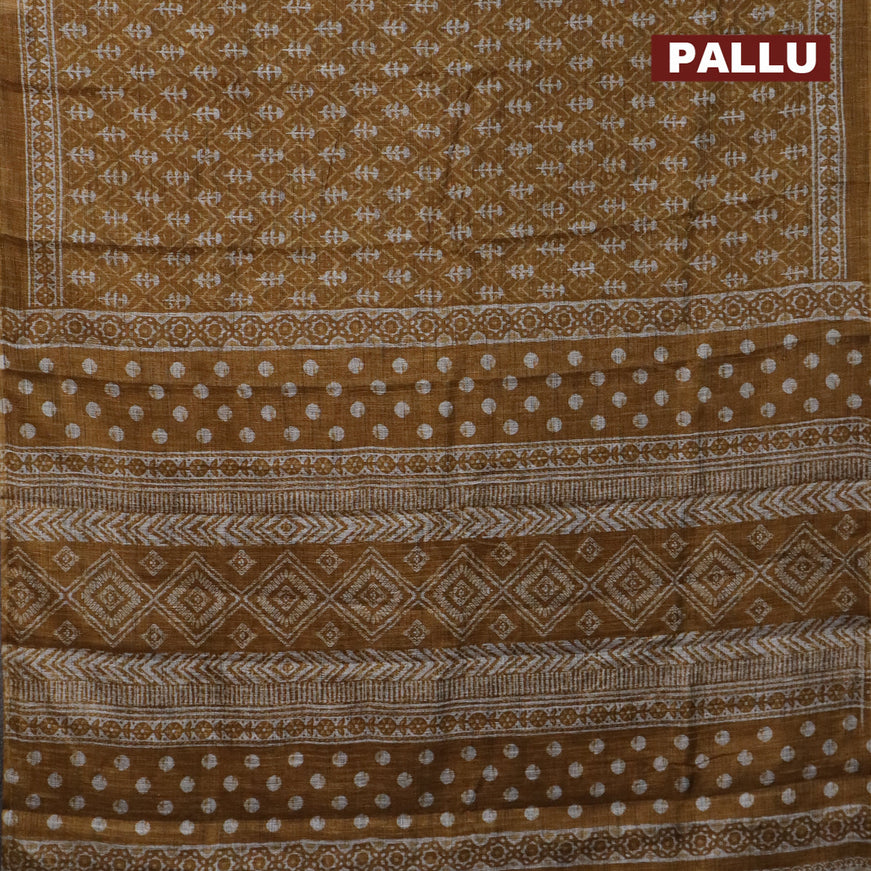 Jute cotton saree dark mustard with allover ikat prints and printed border