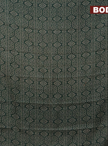 Jute cotton saree green with allover ikat prints and printed border