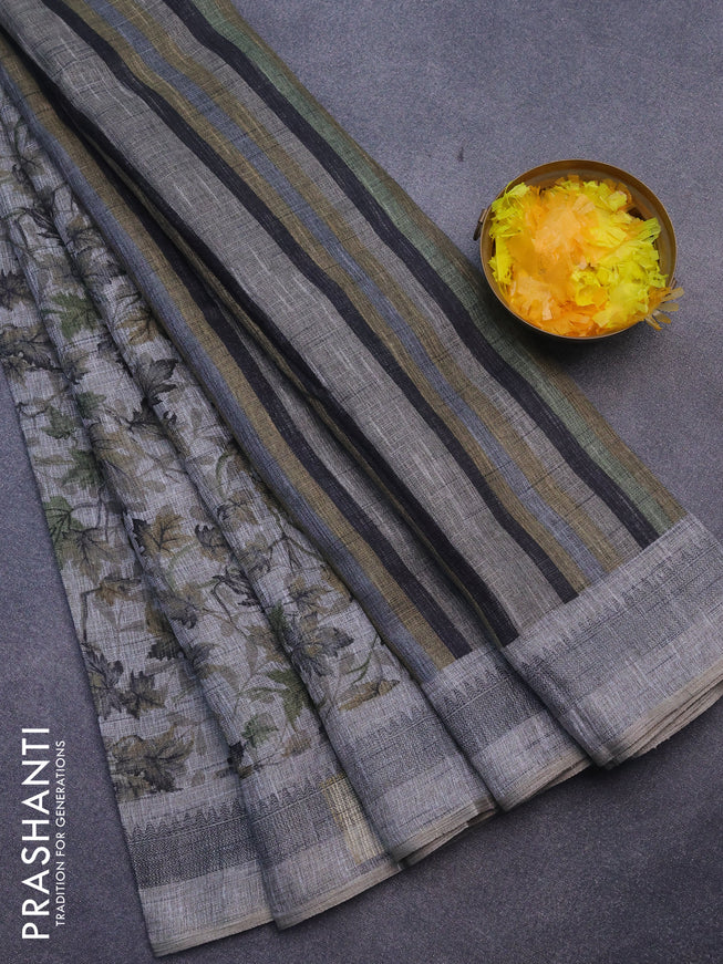 Jute cotton saree grey and green with allover leaf prints and simple border