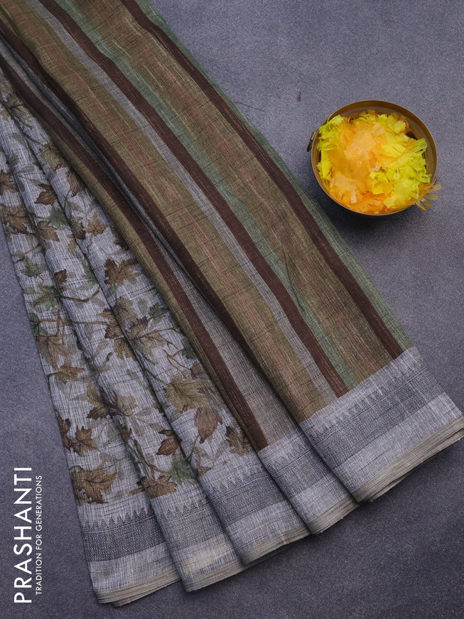 Jute cotton saree grey and green with allover leaf prints and simple border